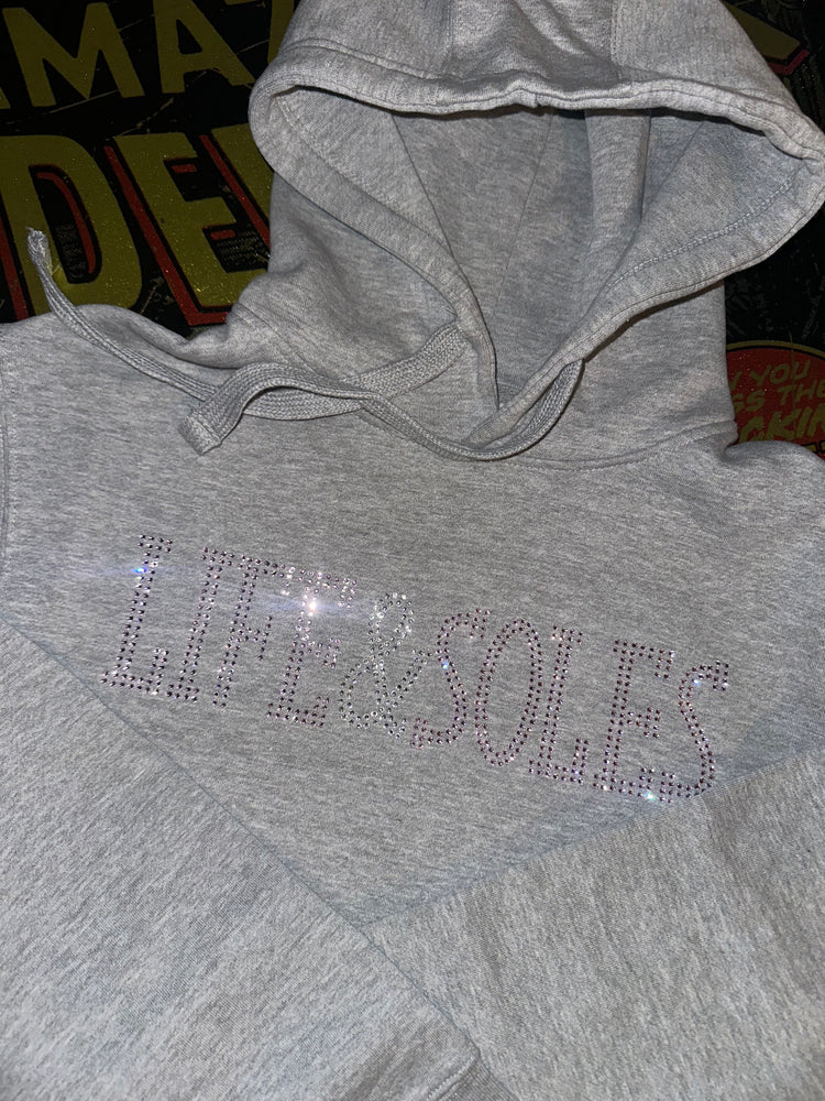 Sudadera con capucha rosa/gris con diamantes de imitación transparente